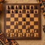 An overhead flat-lay photograph of a wooden chessboard set in an Italian Game position, surrounded by African textile patterns, carved wooden chess.